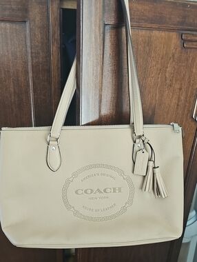 Coach Beige Leather Tote with Tassel Charm